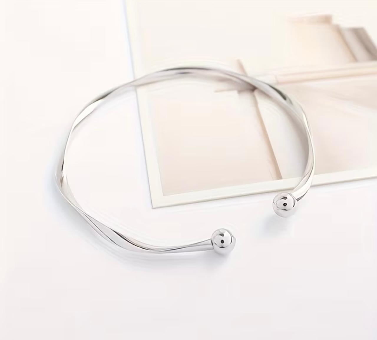 Twisted Silver Cuff Bangle – Enchanted Elegance